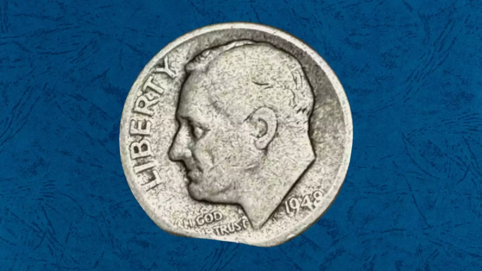 1948 dime clipped planchet error showing curved missing section at the coin's edge