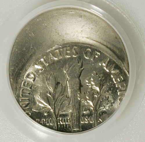 1948 dime off-center strike error showing design shifted from center with blank crescent area visible
